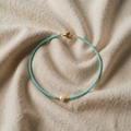 Barokkityylinen turkoosi helmikaulakoru choker-pituudella